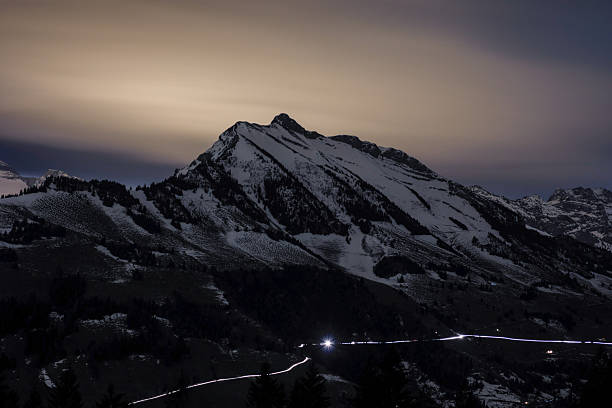 istock Alps by night at winter 2251543918