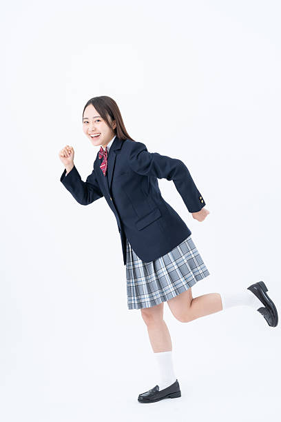 istock High school girl on white background 2251547174