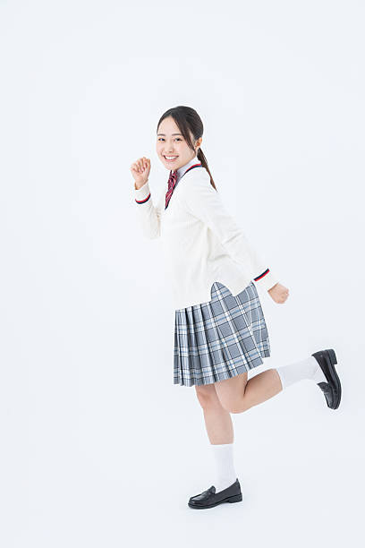istock High school girl on white background 2251548074