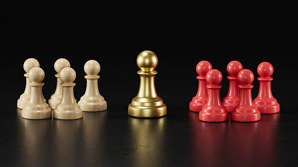istock Golden Pawn Between Beige and Red Groups: Symbolizing Prominence 2251548214