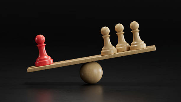 istock Red Pawn vs Three Beige: Representing Proportional Influence 2251548236