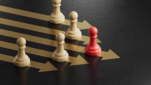 istock Red Pawn Leading Beige: Symbolizing Leadership Across Diverging Paths 2251548240