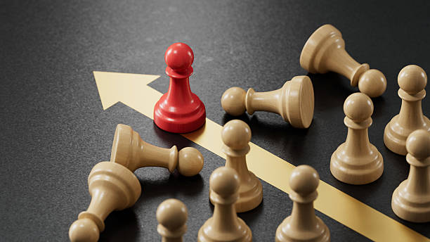 istock Red Pawn, Gold Arrow: Embodying Victory and Advancing Success 2251548241
