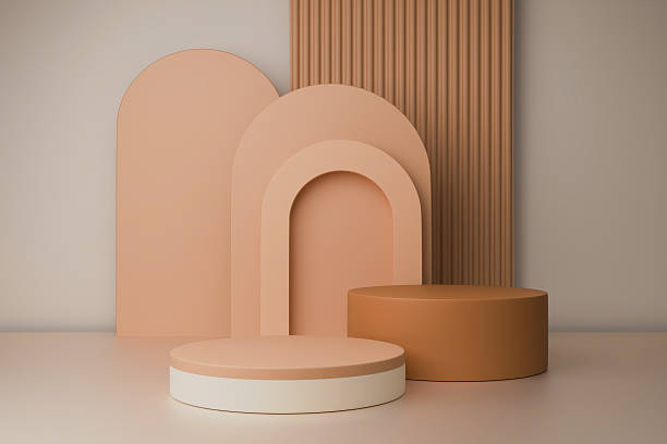 istock 3D render Pastel podiums peach, beige with arch shapes on a white base 2251549765