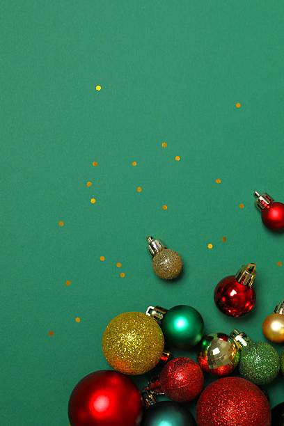 istock Top view of Christmas decorations, confetti on color background 2251550086
