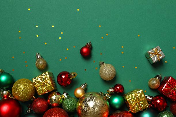 istock Top view of Christmas decorations, confetti on color background 2251550139