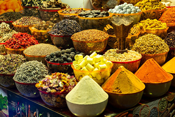 istock Herb and Spice Display in Wooden Market Containers 2251551926