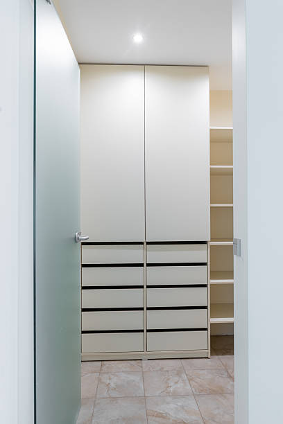 istock Spacious Organized Closet with Shelving and Storage Drawers for Home Interiors 2251552515