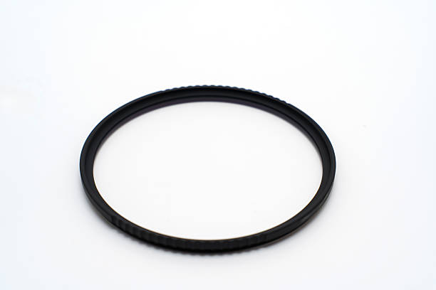istock Close up of a lens filter on a light background 2251553925