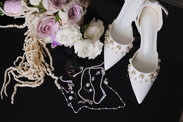 istock Elegant bridal accessories on a dark surface 2251555261