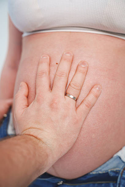 istock Expecting parents sharing a special moment together 2251555279