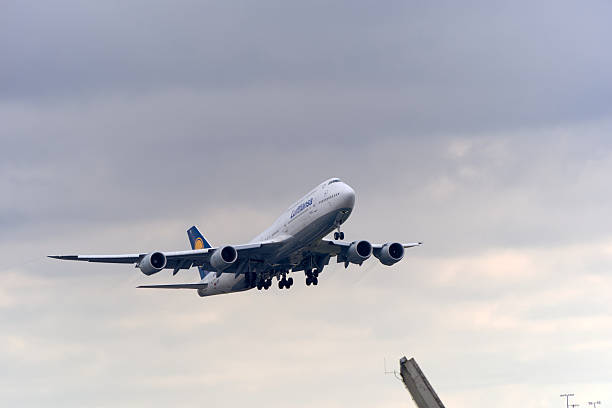 Lufthansa passenger airplane type Boeing 747-8 registration D-ABYI taking off from German Frankfurt Airport on a cloudy autumn day. Photo taken November 3rd, 2025, Frankfurt am Main, Germany.