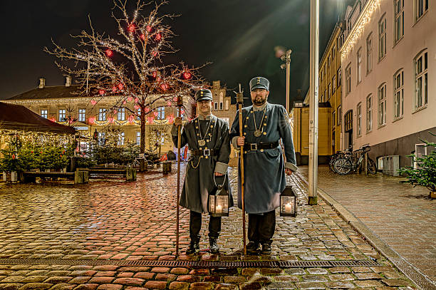 night watchmen dressed in traditional historical costumes in Viborg, Denmark, December 5, 2025