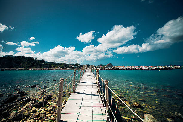 travel and vacation concept - wooden bridge, sea, summer, vacation, happy time