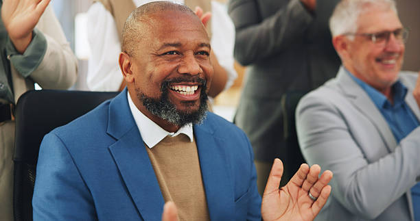 istock Excited, men and applause for presentation, success and celebration for training session or meeting. Happy, audience and clapping for achievement in seminar, collaboration and listening to speech 2251566225