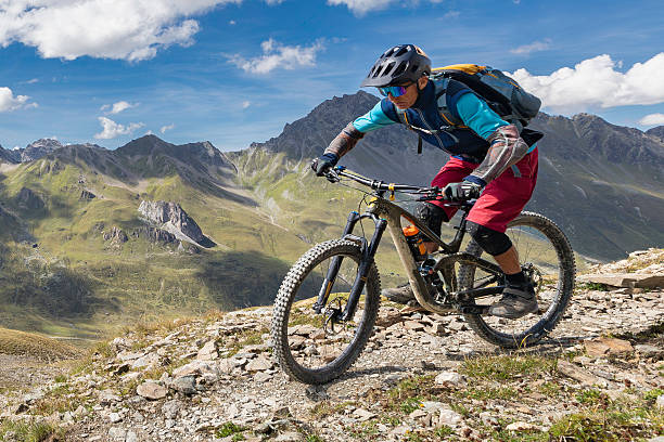istock Sunny mountain biking at Engadin Alps. 2251567719