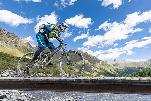 istock Male mountain biker at a little bridge. 2251567866