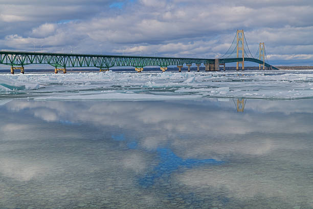Landscape of blue Ice shards and the Mackinac Bridge, Straits of Mackinac, Lake Michigan, Lower Peninsula, Michigan, USA