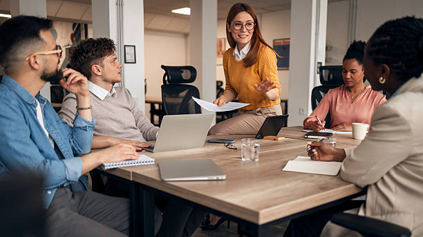 istock Team Discussion in Modern Office With Engaged Participants and Professional Atmosphere 2251568912