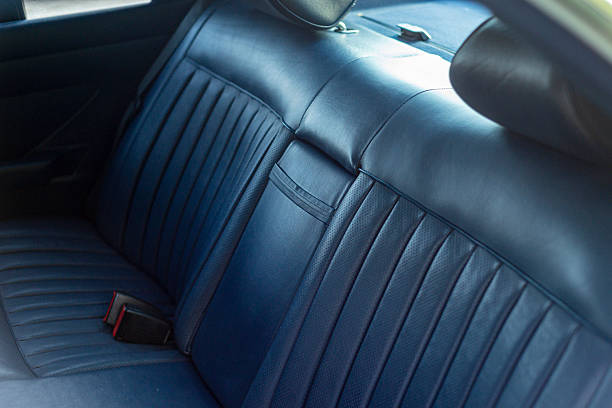 Rear seat with blue leather in luxury sedan.