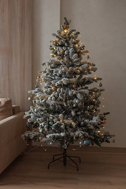 istock Decorated Christmas Tree into Cozy Living Room 2251573624