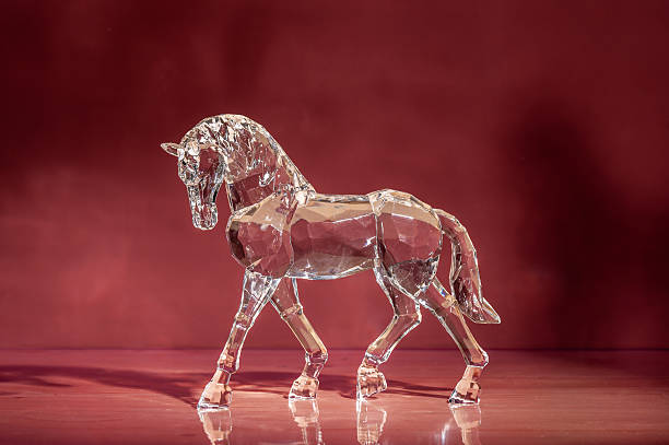 istock Crystal Horse on red background. 2251578634