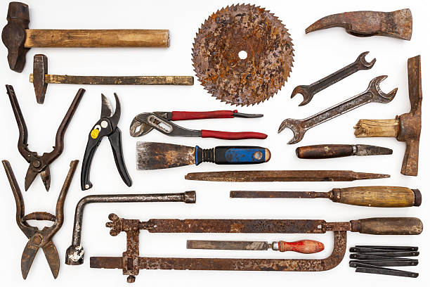 istock Flat lay of old hand tools on white background. 2251582899