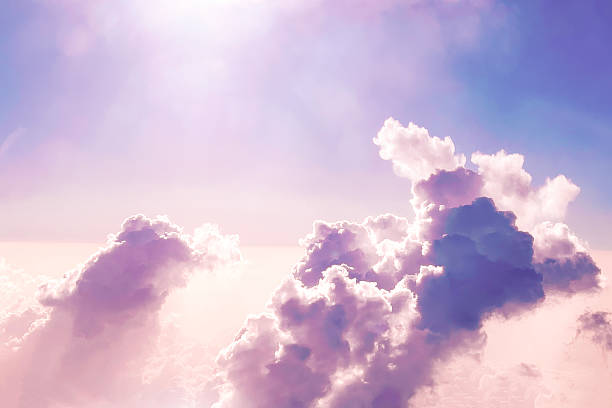 istock Colorful Clouds in the Sky During Daytime With Sunlight Shining Above Them 2251583238