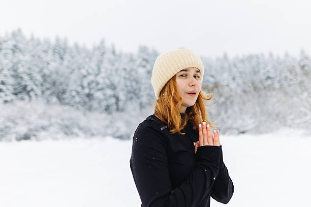 istock Young woman in Prayed Pose during yoga exercises outdoors in winter day 2251583618