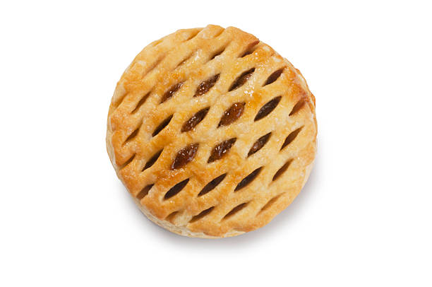 Freshly baked berry pie with golden crust, juicy red filling, and a slice cut out. Isolated on transparent background, food concept