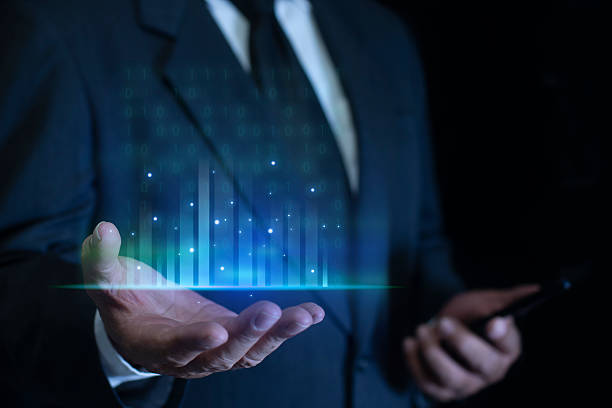 istock Businessman holding big data futuristic glow lines. Big data analytics and business intelligence analytics. Datum digital background. 2251592451