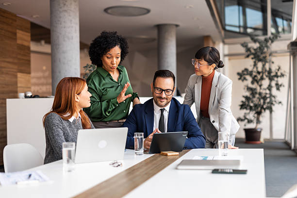 istock Professional Team Collaboration During Office Meeting in Bright Modern Environment 2251596397
