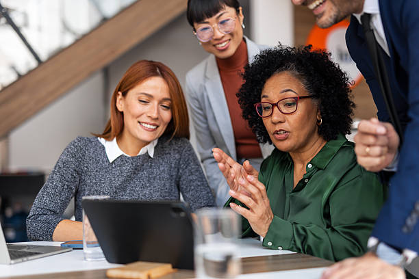 istock Diverse Team Collaborating on a Project During an Office Meeting 2251596414