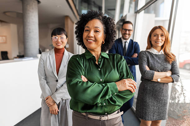 istock Confident Business Team Collaborative Success in Modern Office Environment 2251597290
