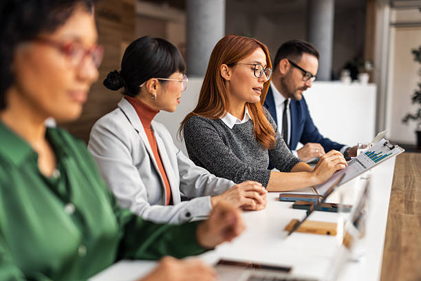 istock Office Team Engaged in Productive Discussion During a Meeting 2251597932