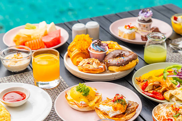 istock Brunch buffet by pool with vibrant pastries, fresh fruit, savory 2251598327