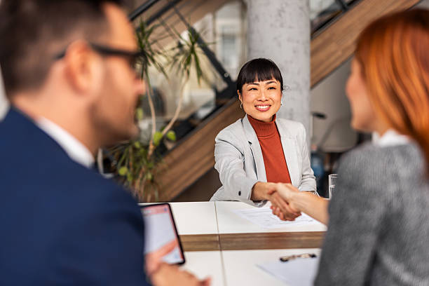 istock Hiring Manager Shakes Hands During Successful Job Interview 2251599648
