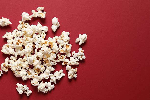 istock Tasty popcorn on a colored background 2251608810