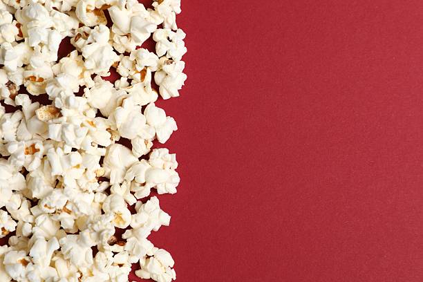istock Tasty popcorn on a colored background 2251609015