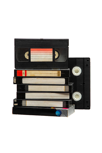 istock Stack of five vintage VHS tapes standing upright, isolated on a clean white background. 2251619961