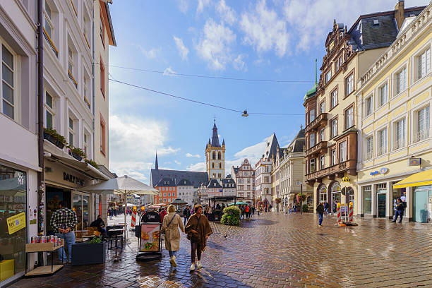 Trier, Germany - October 11, 2024: Scene of the Hauptmarkt square, with various buildings, locals and visitors, in Trier, Rhineland-Palatinate, Germany