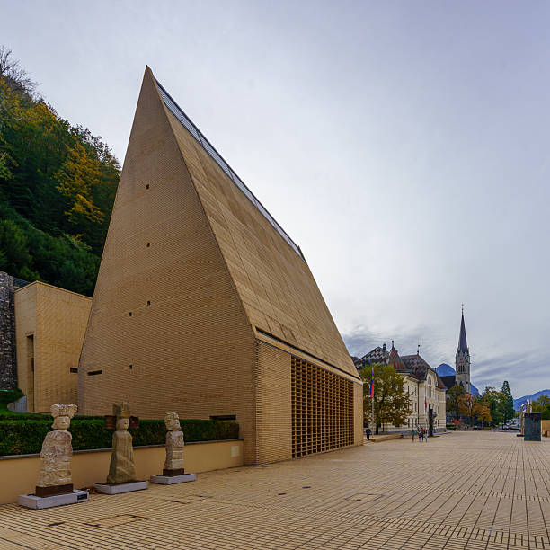 Vaduz, Liechtenstein - October 19, 2024: Street view, with various buildings, locals and visitors, in the center of Vaduz, Liechtenstein