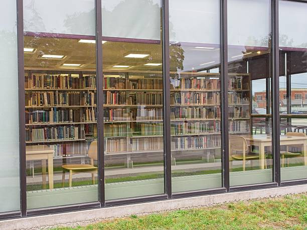 Library stacks a view of books behind a window from outside