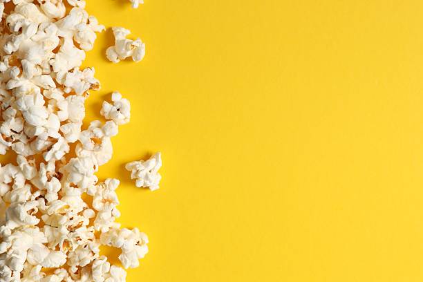 istock Tasty popcorn on a colored background 2251625455