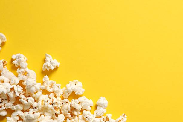 istock Tasty popcorn on a colored background 2251625462