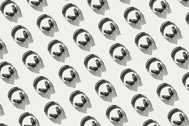 istock Black headphones seamless pattern on white background with shadow effects for music enthusiasts 2251637073