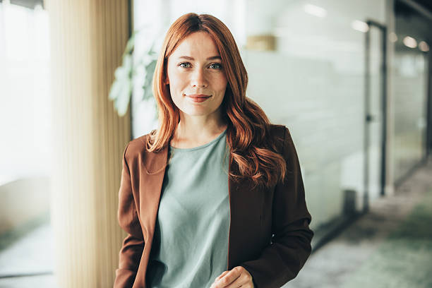 istock Confident businesswoman in modern office 2251637440