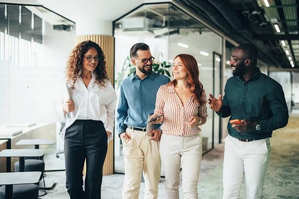 istock Professional colleagues having a conversation on the move 2251637451