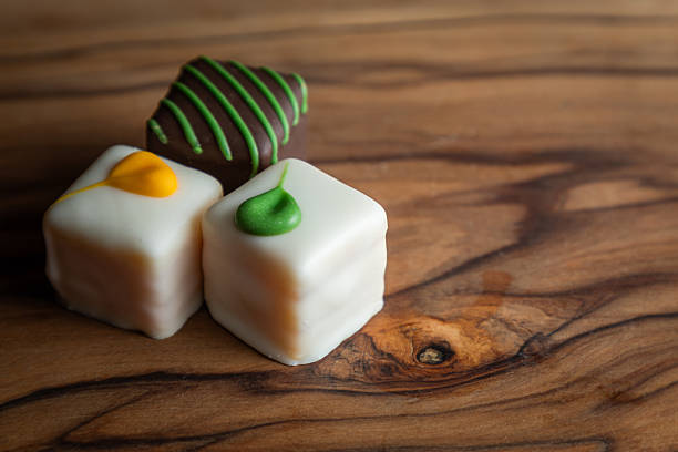 istock Dipped Chocolate Squares on Wood 2251637553