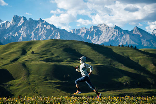 istock Trail runner running on the high altitude grassland mountain top 2251646904